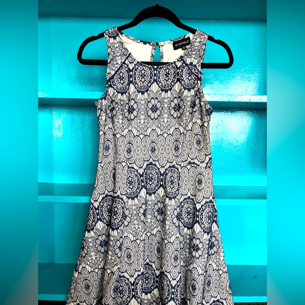 White dress with blue lace overlay, loved but in great condition.  Medium
